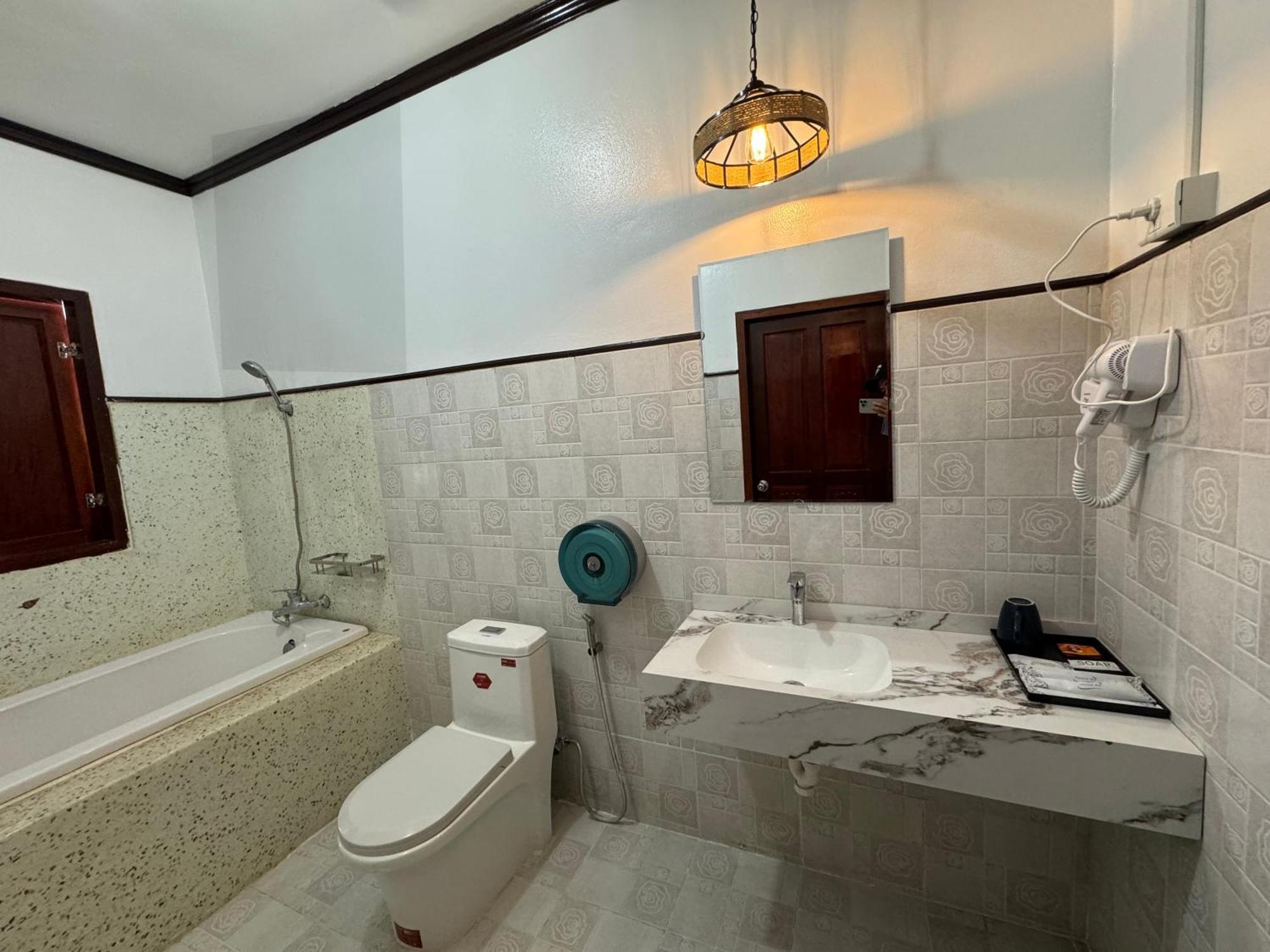 Win Hotel Vang Vieng Exterior photo
