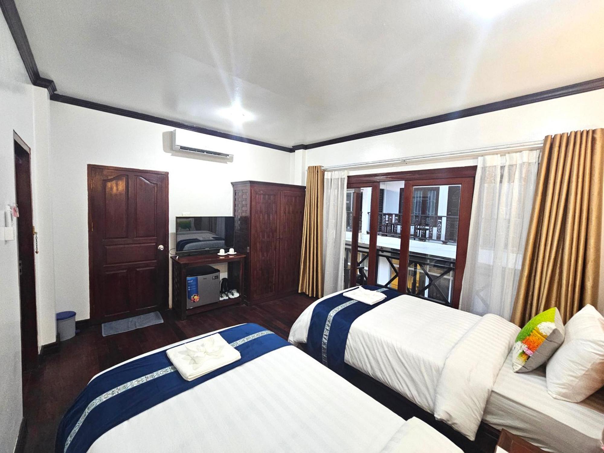 Win Hotel Vang Vieng Exterior photo
