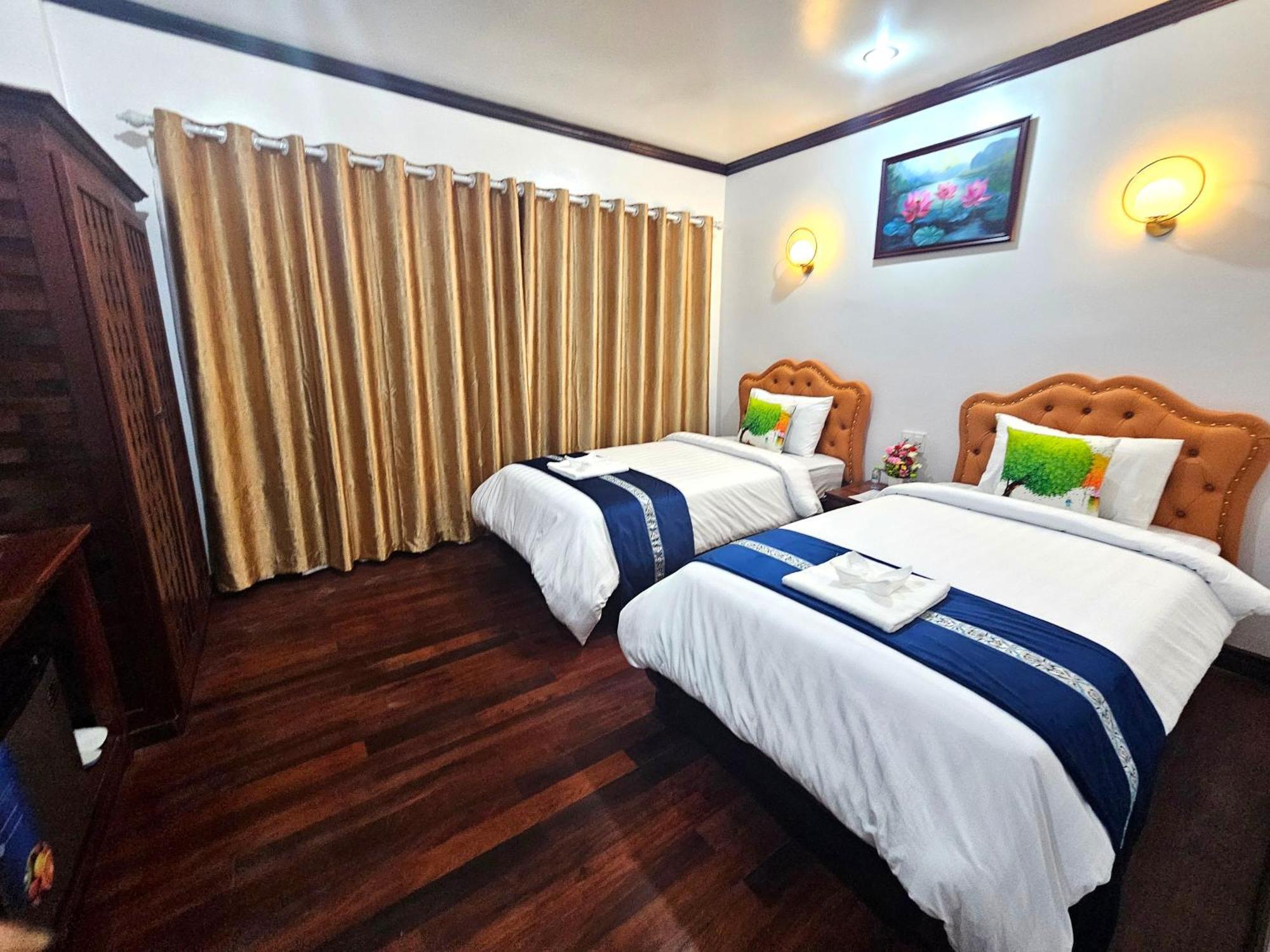 Win Hotel Vang Vieng Exterior photo