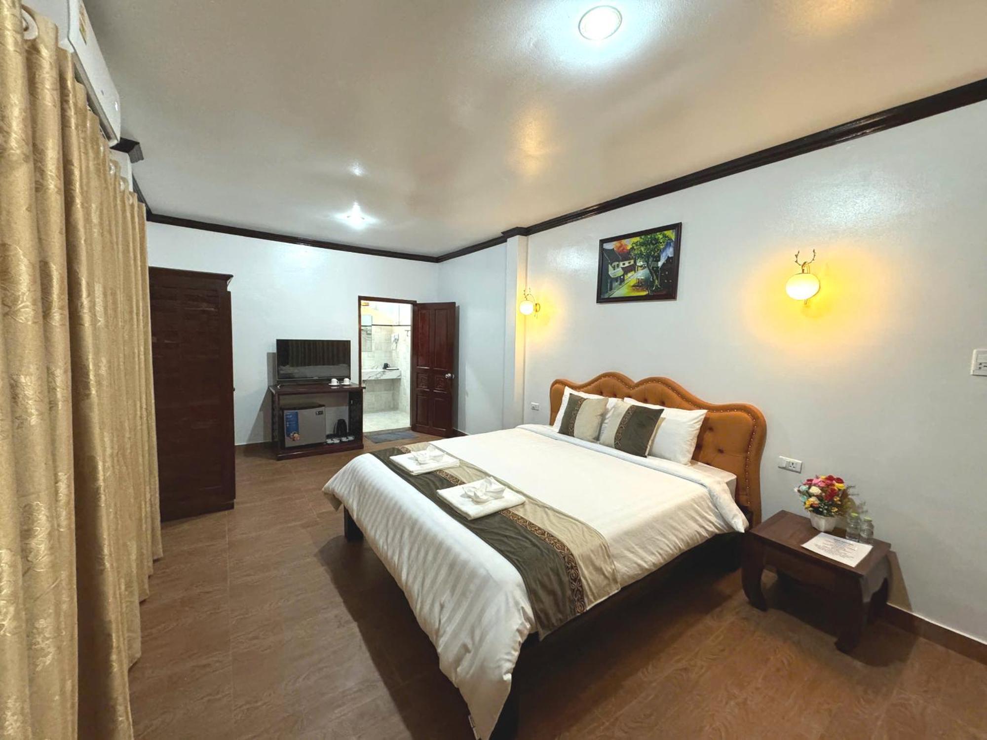 Win Hotel Vang Vieng Exterior photo