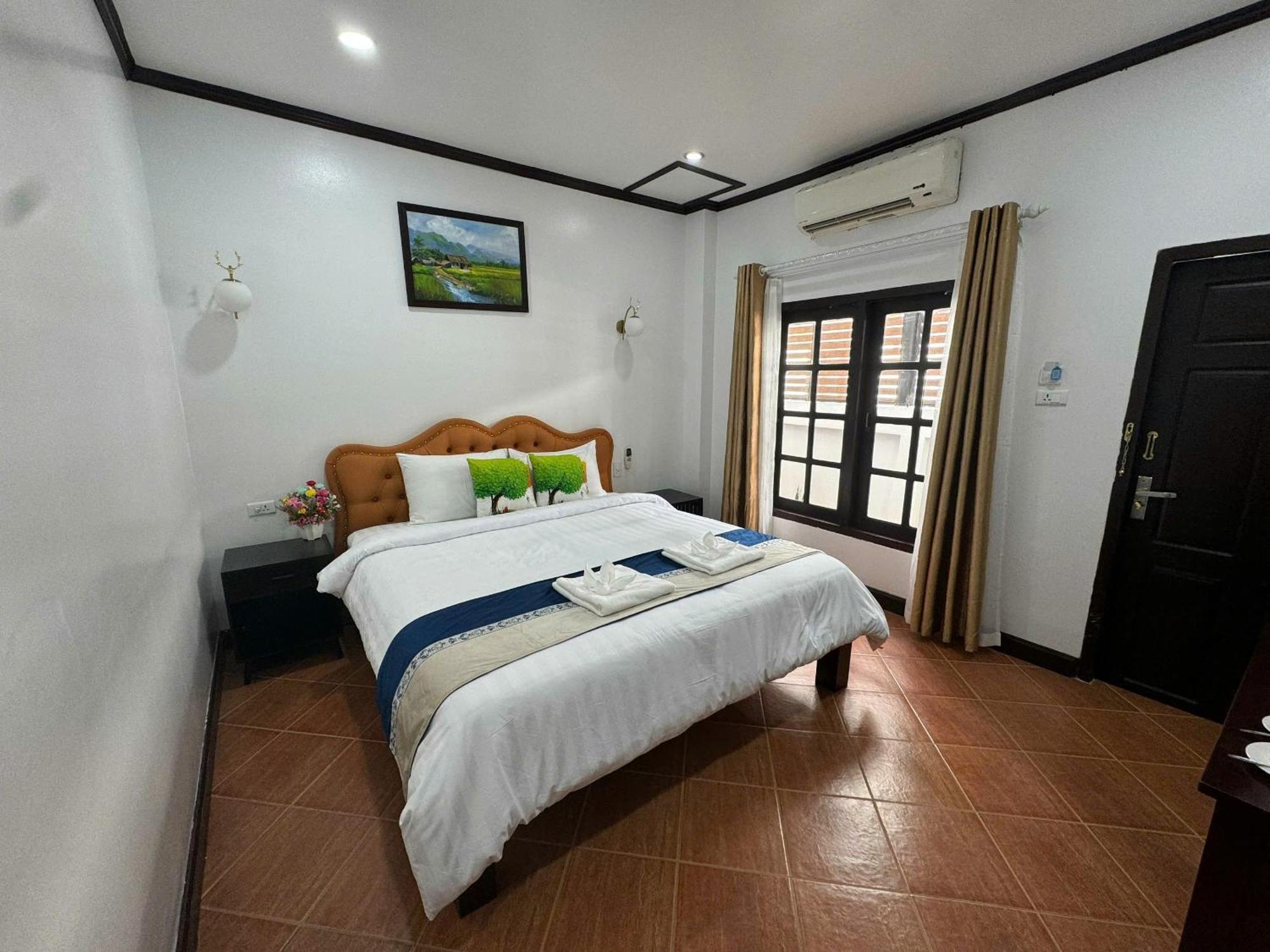 Win Hotel Vang Vieng Exterior photo